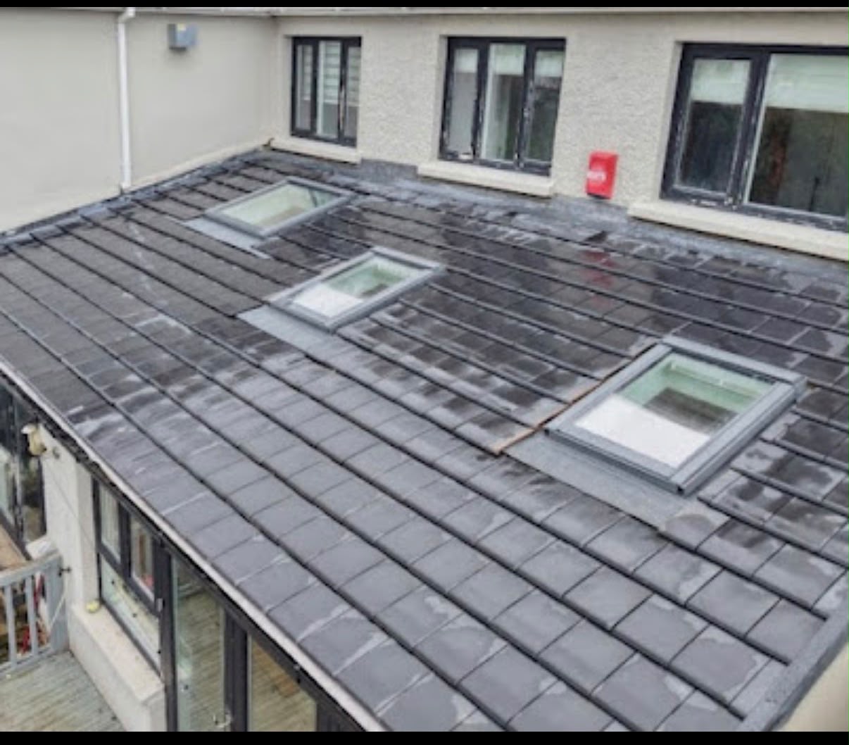Slate roof with Velux skylight installation in West Midlands, Clean Gutters & Roofing Services